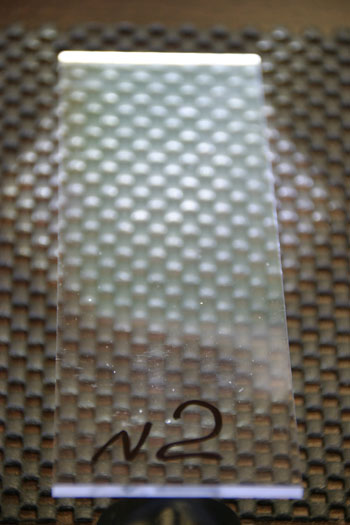 Пластинка из поликарбоната после воздействия незамерзающей жидкости для омывания стекол Liqui Moly ANTIFROST Scheiben-Frostschutz -25С.